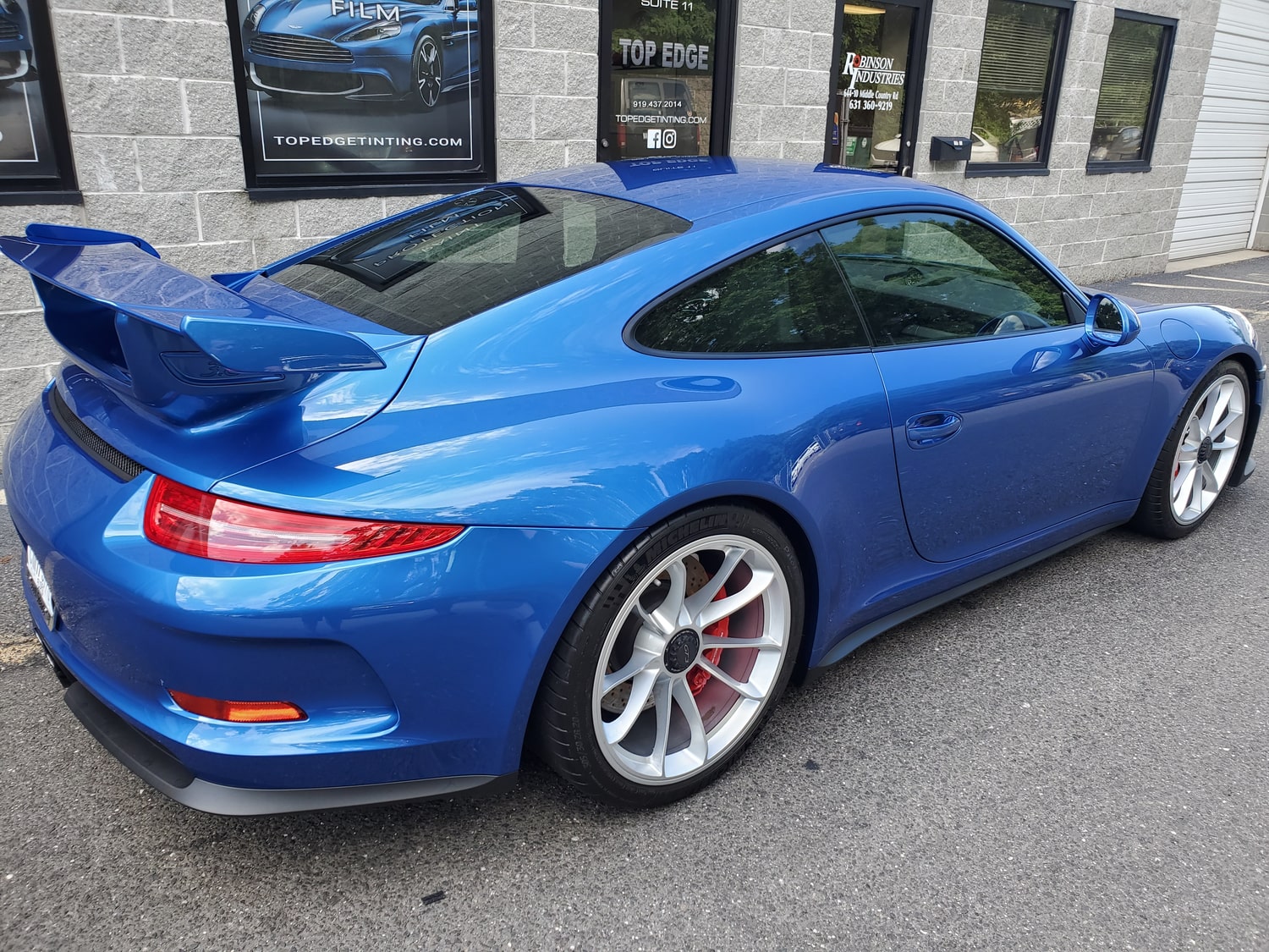 blue porshe sportscar